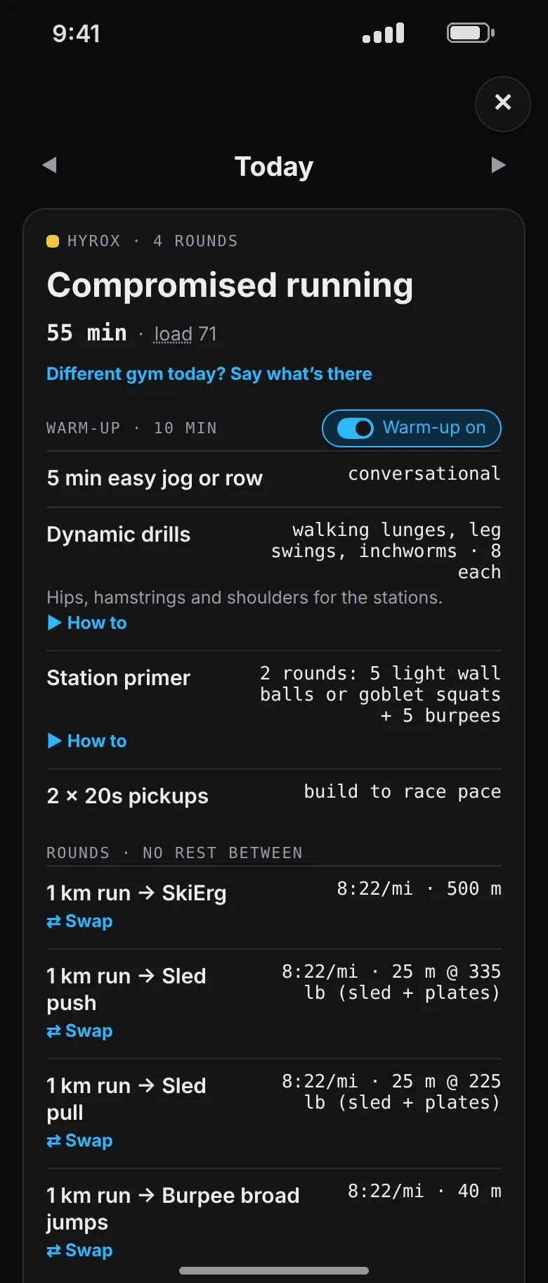 A compromised running session: warm-up, a station primer, then rounds of a 1 km run into the SkiErg, sled push at 335 pounds and sled pull at 225 pounds.